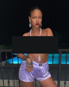Rihanna again in controversy tweeted topless photo with Lord Ganesha's pendant