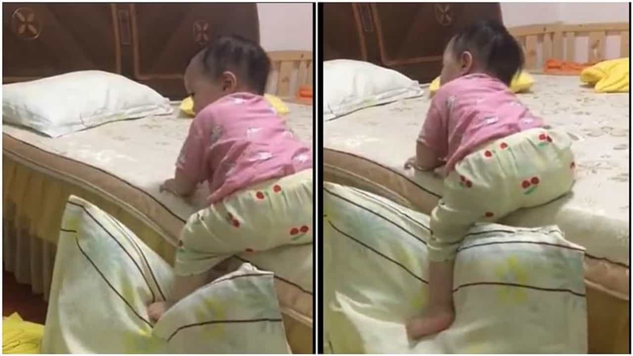પલંગ પરથી ઉતરવા માટે નાના બાળકે લગાવ્યો જુગાડ, વીડિયો જોઇ લોકો બોલ્યા -કોશિશ કરને વાલો કી હાર નહી હોતી