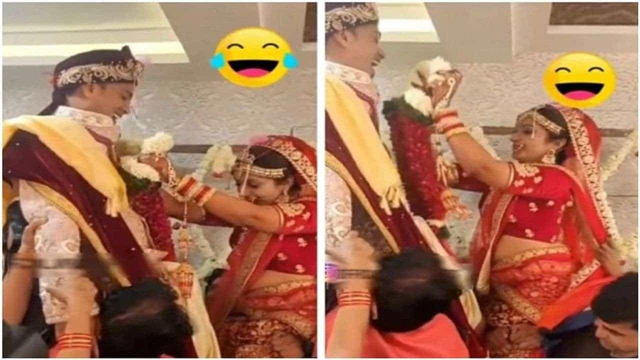 Viral video : વરમાળા દરમિયાન વરરાજાએ દુલ્હનને જીતવા માટે કર્યું કંઈક આવું, વીડિયો જોઈને તમે પણ હસીને લોટપોટ થઇ જશો