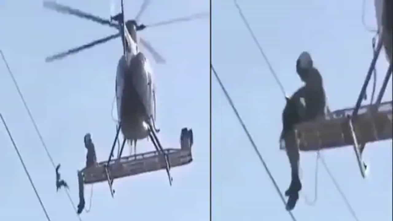 દિલધડક રેસક્યુ : વાયરમાં ફસાયેલા પક્ષીને બચાવવા આકાશમાંથી ઉતર્યો દેવદૂત, જુઓ Video