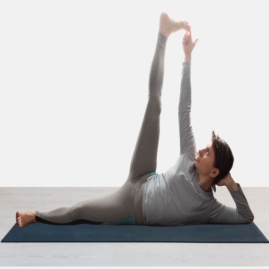 Anantasana - Lie down on your back.  take a turn  Then raise your legs.  Try to hold the thumb with your hand.  Keep your other leg straight on the ground.  Place your other hand under your head for balance.