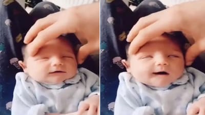 Amazing Video: કપાળ પર મજેદાર મસાજ કરતા શિશુએ કંઈક આપ્યા આવા અદ્ભૂત રિએક્શન