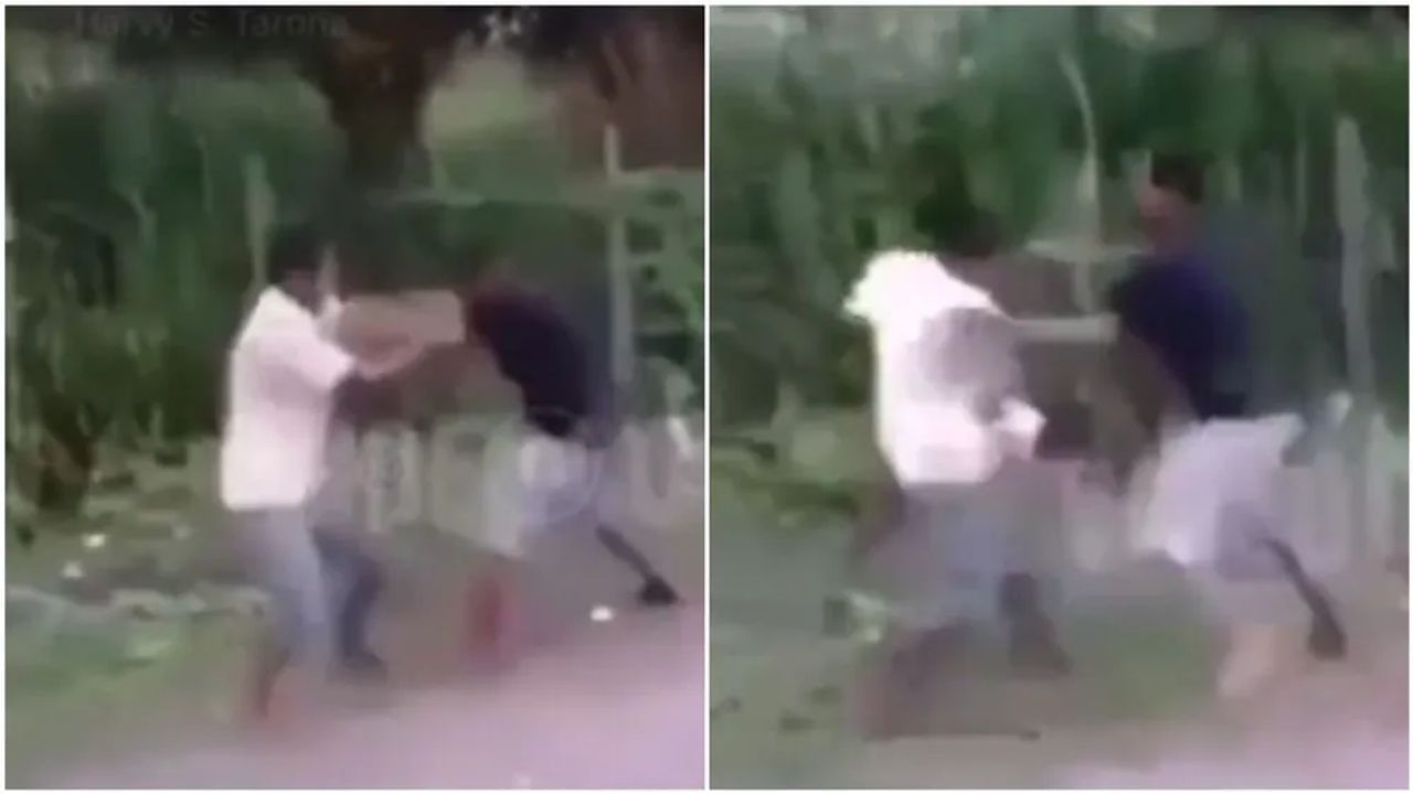 viral video man tries to become hero during fight between two pepole