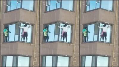 આવી રીતે કોણ સફાઈ કરે.....?, 10માં માળે લટકાઈને કરી બારીની સફાઈ, લોકો આશ્ચર્યમાં મુકાયા