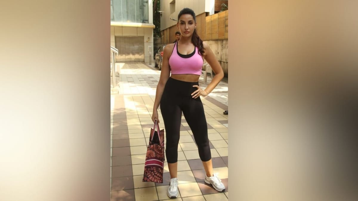 નોરા ફતેહીનો ફોટો ક્લિક કરતી વખતે પડી ગયો માણસ, એક્ટ્રેસે તેની કરી મદદ, જુઓ Viral Video