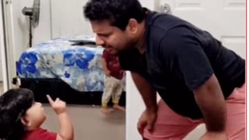 Viral video: Cute little girl was seen innocently scolding her father, the video went viral on social media.