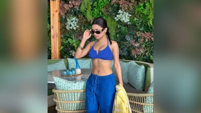 આ તસવીરોમાં અવનીત કૌર બ્લુ કલરના બ્રાલેટ અને લોઅરમાં ખૂબ જ હોટ પોઝ આપતી જોવા મળે છે. (Image: Instagram)