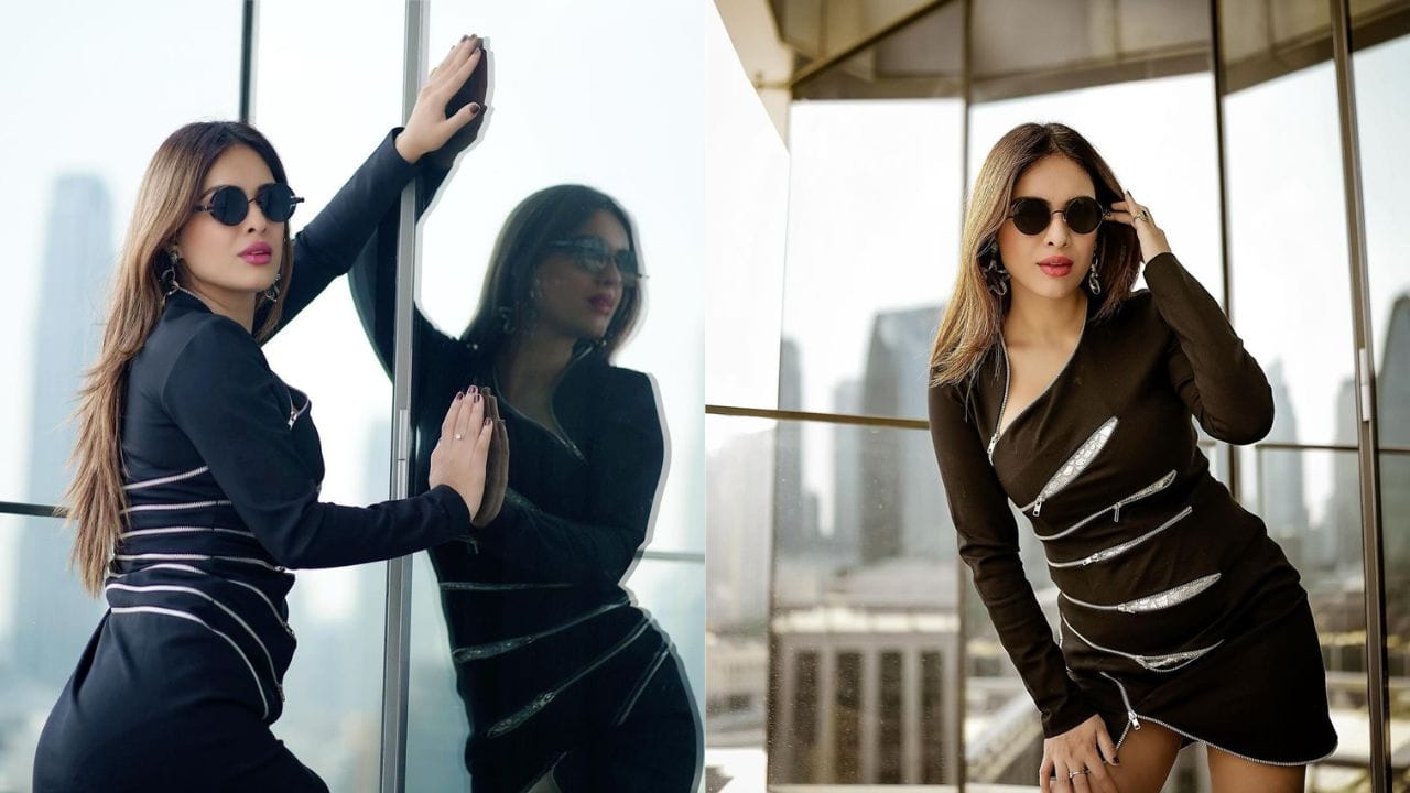 તસવીરોમાં તમે જોઈ શકો છો કે નેહાએ બ્લેક શોર્ટ ડ્રેસ પહેર્યો છે. આ સાથે તેણે બ્લેક ગોગલ્સ પહેર્યા છે જે તેના લુકને કમ્પ્લીટ કરી રહ્યા છે. આટલું જ નહીં તેણે બ્લેક કલરની હાઈ હીલ્સ પણ પહેરી છે જેમાં તે ખૂબ જ સુંદર લાગી રહી છે.  