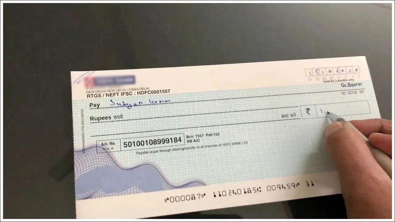 એક લાખ (₹1,00,000) લખતી વખતે ઘણા લોકો 'Lakh' લખે છે, જ્યારે કેટલાક 'Lac' લખે છે. આનાથી ગ્રાહકોમાં મૂંઝવણ ઊભી થાય છે કે બેમાંથી કયો શબ્દ સાચો છે અને શું 'Lac' લખવાથી ચેક રદ થઈ શકે છે?