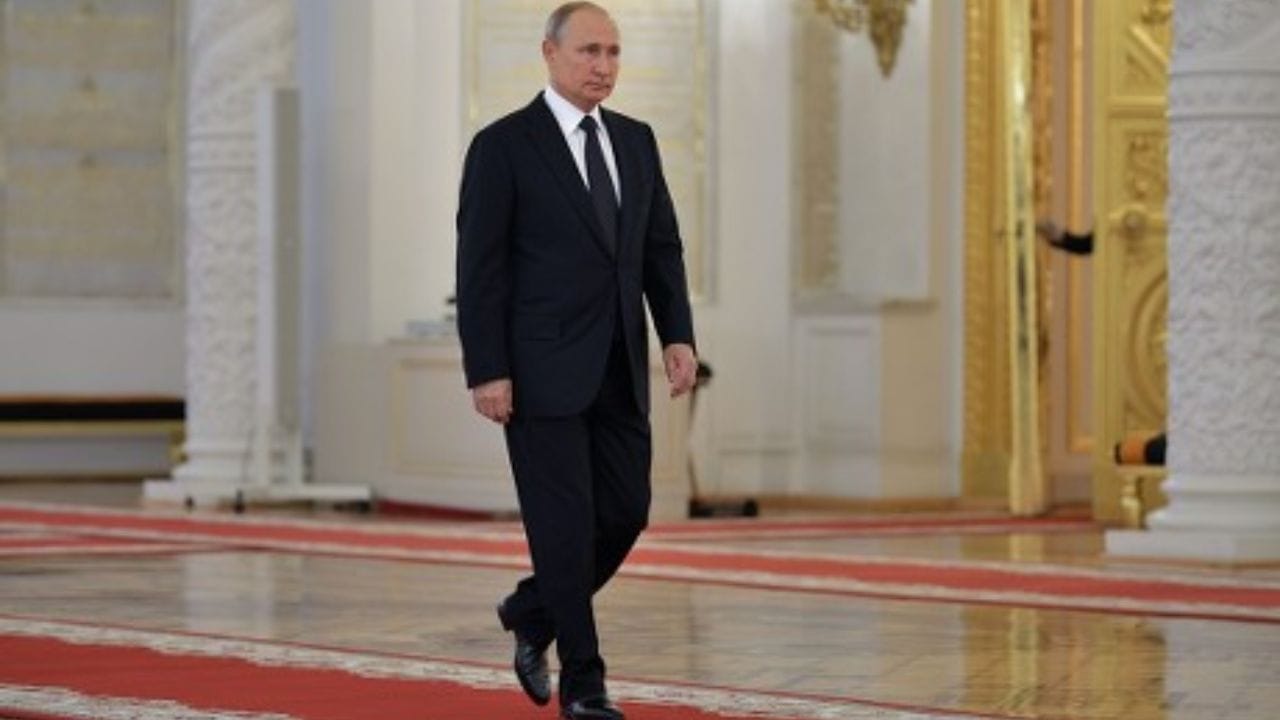Why Putin walks differently