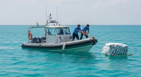 વિદેશી ફિશિંગ બોટમાંથી નશીલો માલ પકડાયો, બે લોકોની અટકાયત