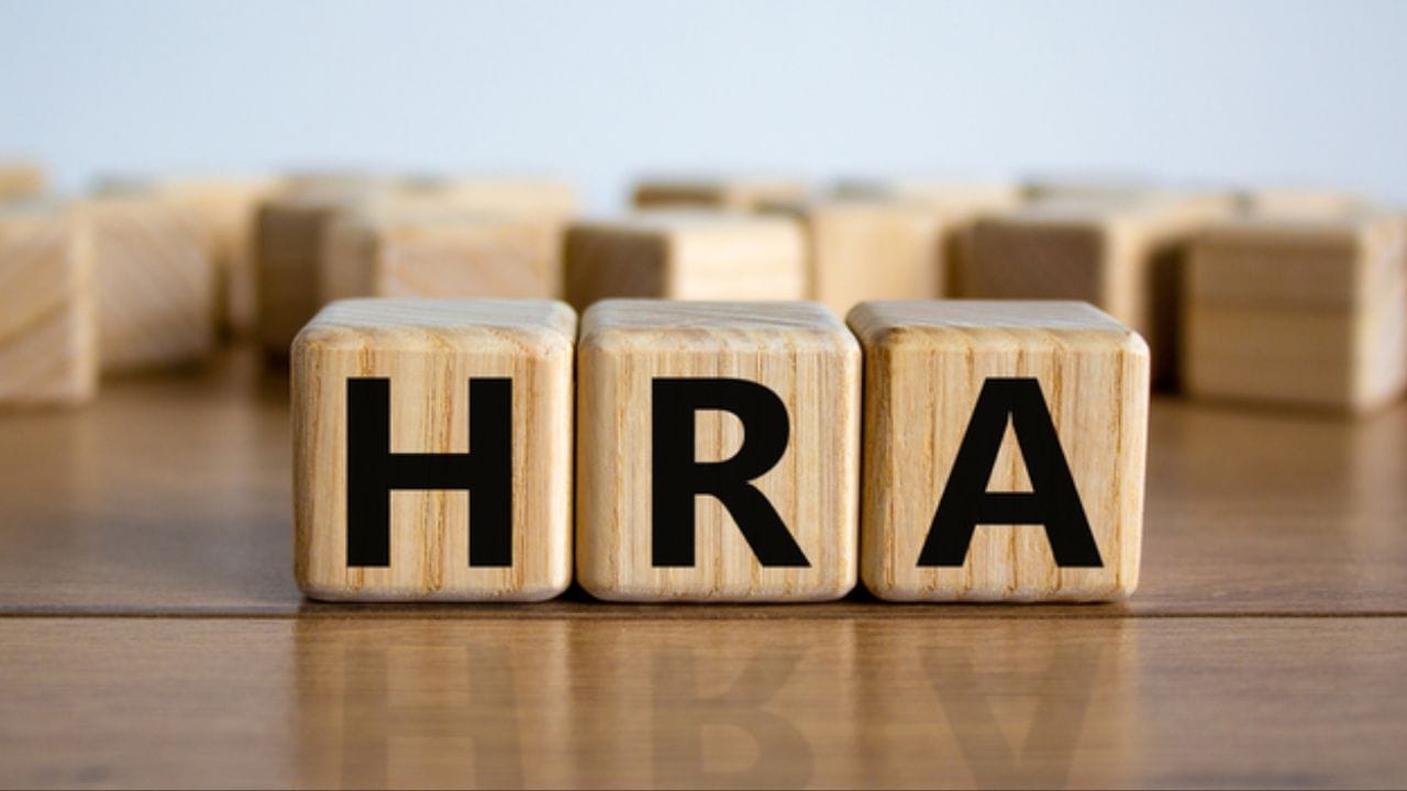 HRA દાવાઓ પર વધુ ચકાસણી: હાઉસ રેન્ટ એલાઉન્સ (HRA) નો દાવો કરનારાઓ માટેના નિયમો હવે વધુ કડક બનાવવામાં આવ્યા છે. જો કોઈ કર્મચારી ₹1 લાખથી વધુનું વાર્ષિક ભાડું ચૂકવે છે, તો તેમના માટે તેમના મકાનમાલિકનો પાન નંબર પ્રદાન કરવો ફરજિયાત રહેશે.વધુમાં, અરજદારોએ એ પણ જાહેર કરવું પડશે કે મકાનમાલિક પરિવારનો સભ્ય છે કે નહીં. 1 એપ્રિલથી, આ માહિતી પ્રદાન કરવા માટે એક અલગ ફોર્મ ભરવાની જરૂર પડશે. આ નવા નિયમો પાછળનો ઉદ્દેશ ખોટા અથવા કપટપૂર્ણ દાવાઓને રોકવાનો છે. (ફોટો ક્રેડિટ- Bharti AXA Life Insurance)