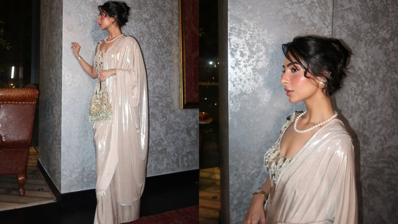 Abhishek Sharma હાલ Indian Premier League (IPL)માં વ્યસ્ત છે, પરંતુ તેની પર્સનલ લાઇફ પણ ચર્ચામાં રહે છે. લૈલા ફૈઝલ સાથે તેનું નામ જોડાતા જ લોકોની રસપ્રદતા વધુ વધી છે. ખાસ કરીને તેની શિમરી સાડી લુકે ફેશન લવર્સનું ધ્યાન ખેંચ્યું છે. તેણે સાડી પર આધુનિક ટ્વિસ્ટ આપીને ક્લાસિક અને ટ્રેન્ડી સ્ટાઇલનું સુંદર મિશ્રણ રજૂ કર્યું છે.