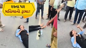 રસ્તાની વચ્ચે સૂઈ ગઈ મહિલા, કલાકો સુધી ટ્રાફિક જામ, જુઓ વીડિયો